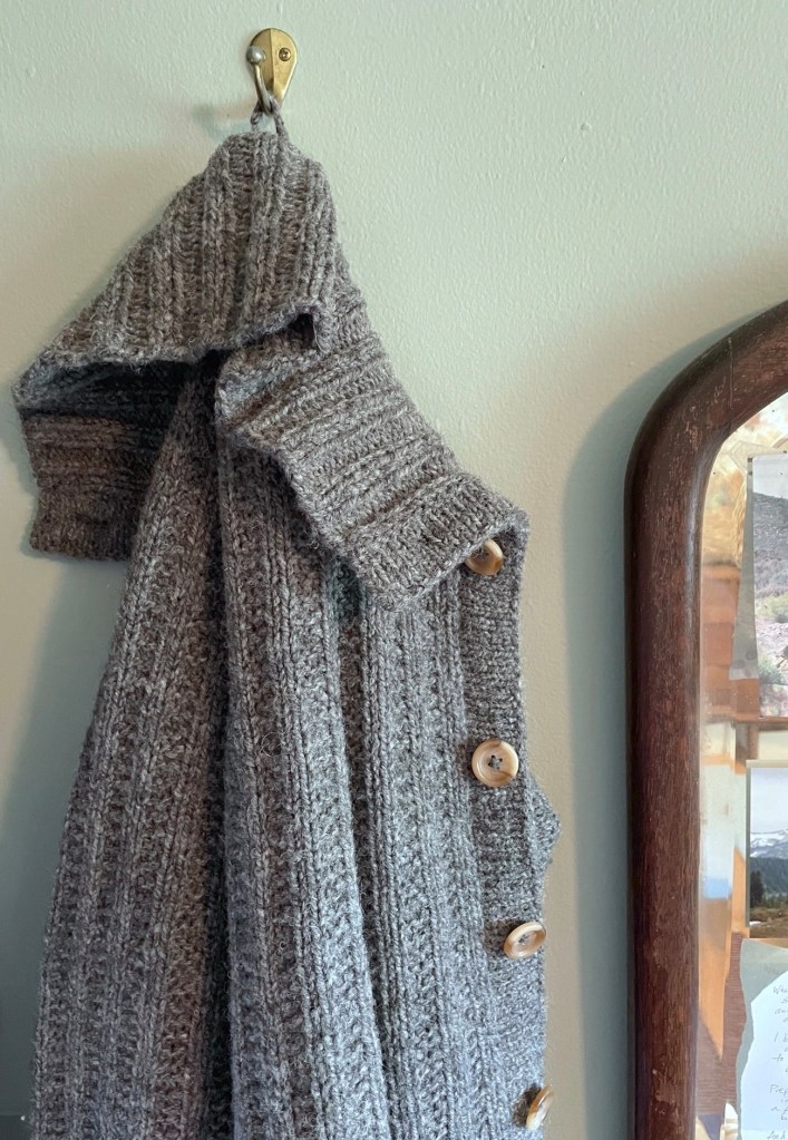 Rugged Softie jacket hanging on a hood from its collar loop