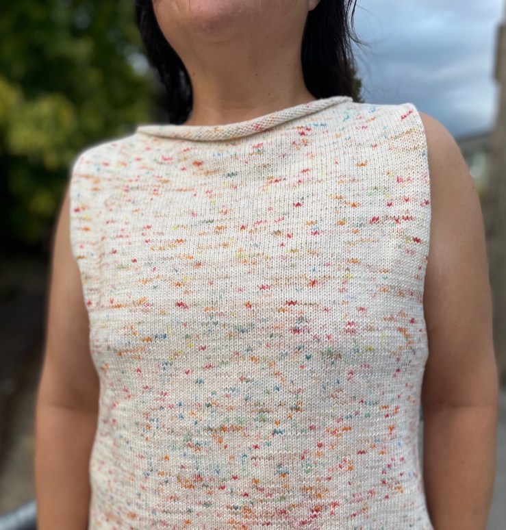 Coolsville sleeveless top in white with sprinkle colors.