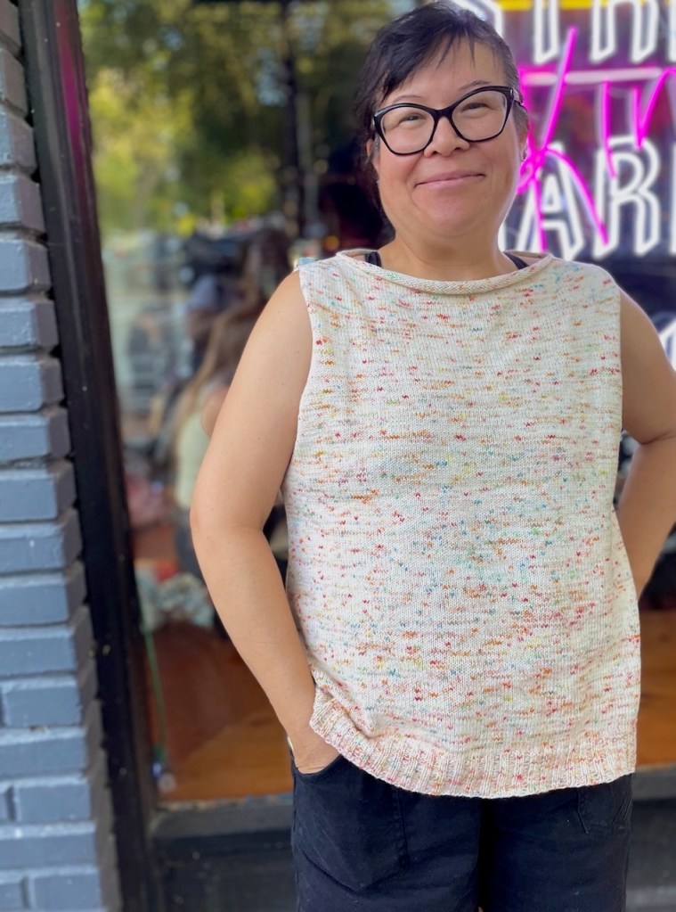 Coolsville sleeveless top in white with sprinkle colors.